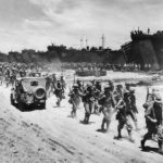 Marines disembark from LSTs on Cape Gloucester