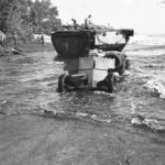 Marines in LVT pull gun onto Beach at Cape Gloucester