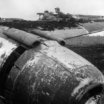 Marines man rangefinder on Wing of Japanese plane on Cape Gloucester