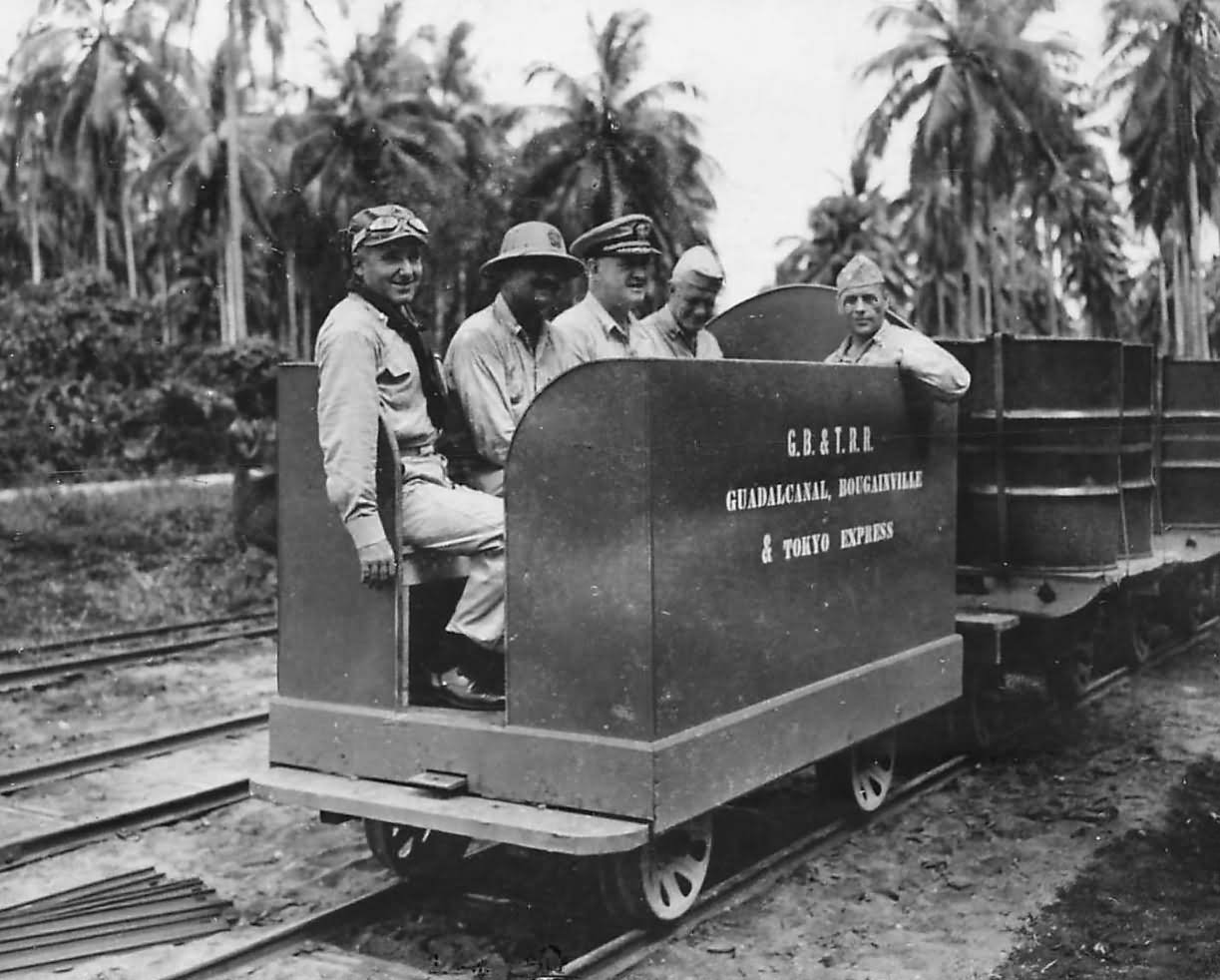 US officers ride on the „Guadalcanal, Bougainville & Tokyo Express” Railroad built by Seabees on Guadalcanal 1943