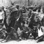 Soldiers with Japanese Prisoners on Guadalcanal 1943