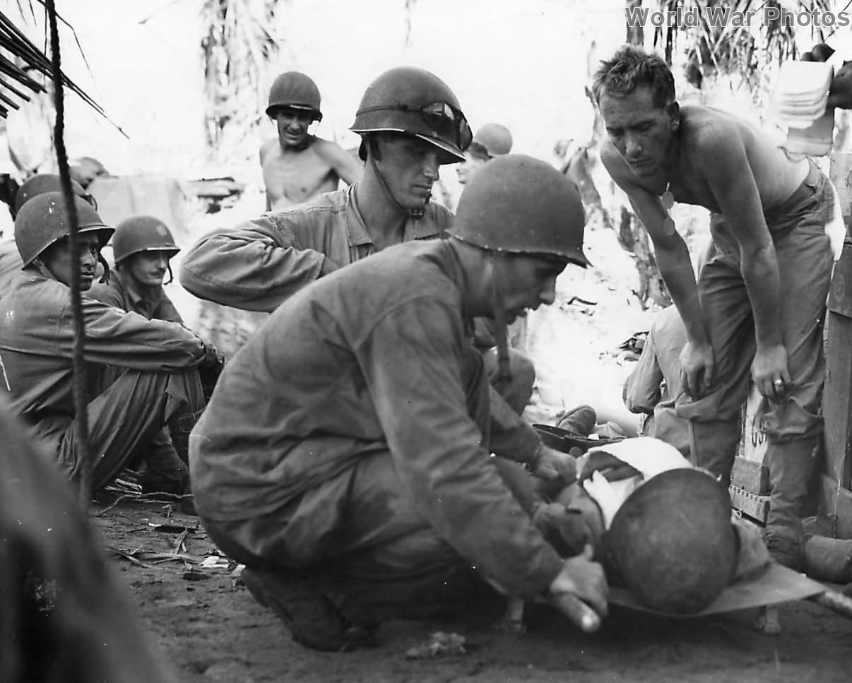 Doctors treat wounded Marines at front line aid station on Guam