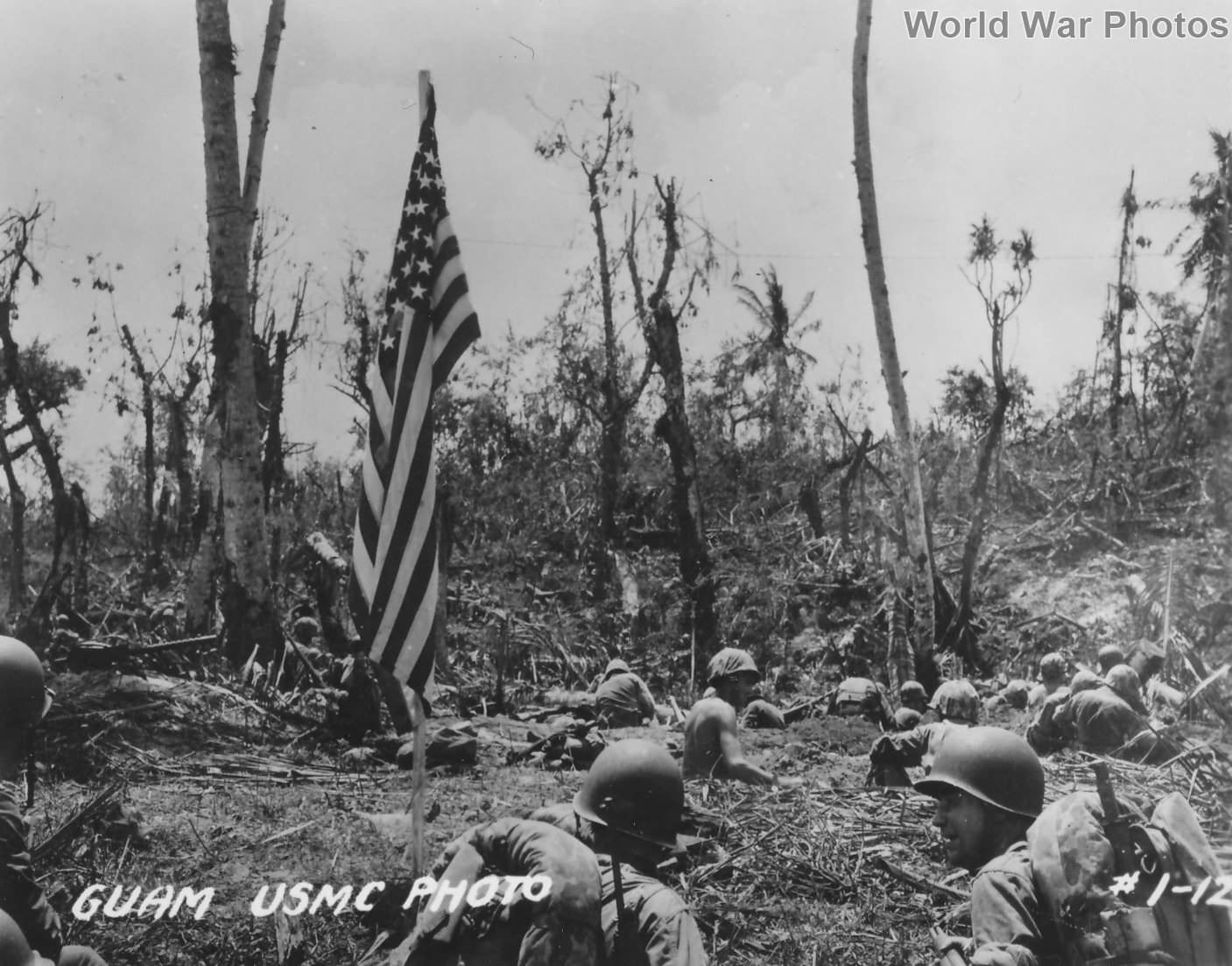 Marines and U.S. flag on Guam July 1944