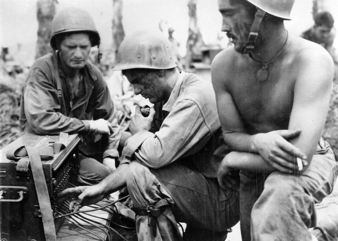 Marines at field telephone switchboard on Guam