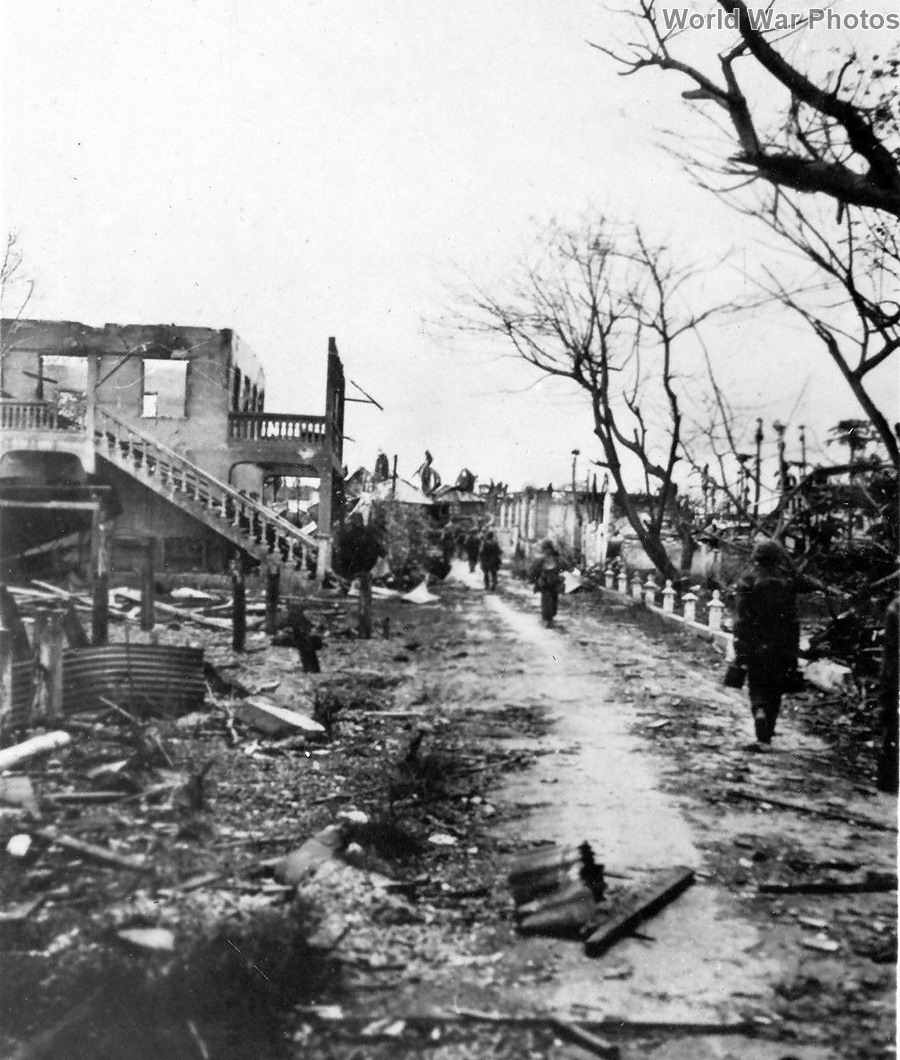 Marines in destroyed town