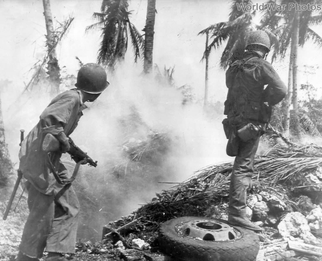 Marines with M1 Garand Rifles smoke out Japanese