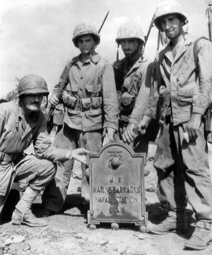 Marines with recovered plaque from Marine Barracks on Orte