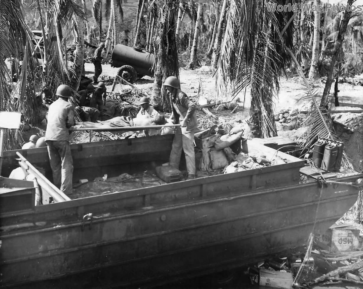 Wounded Marines on Guam loaded on DUWK for transport to ship