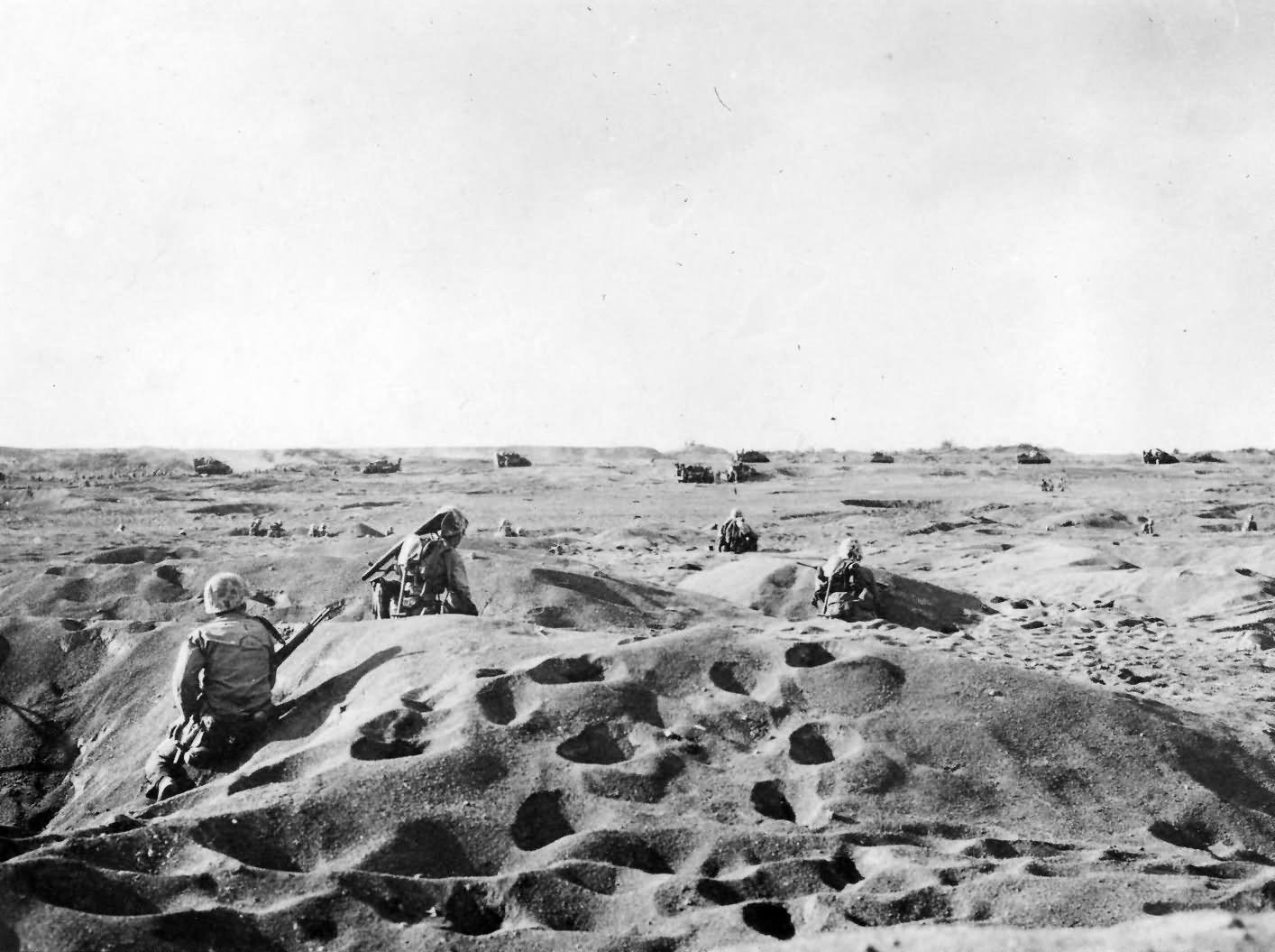 Iwo Jima Marines advancing