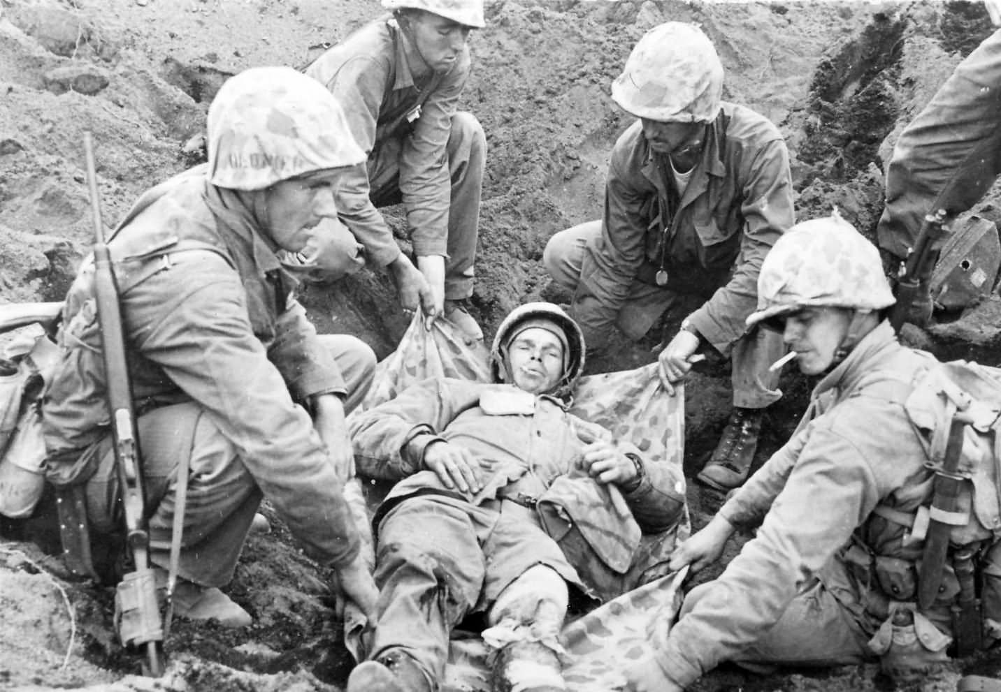 Iwo Jima moving wounded Marine