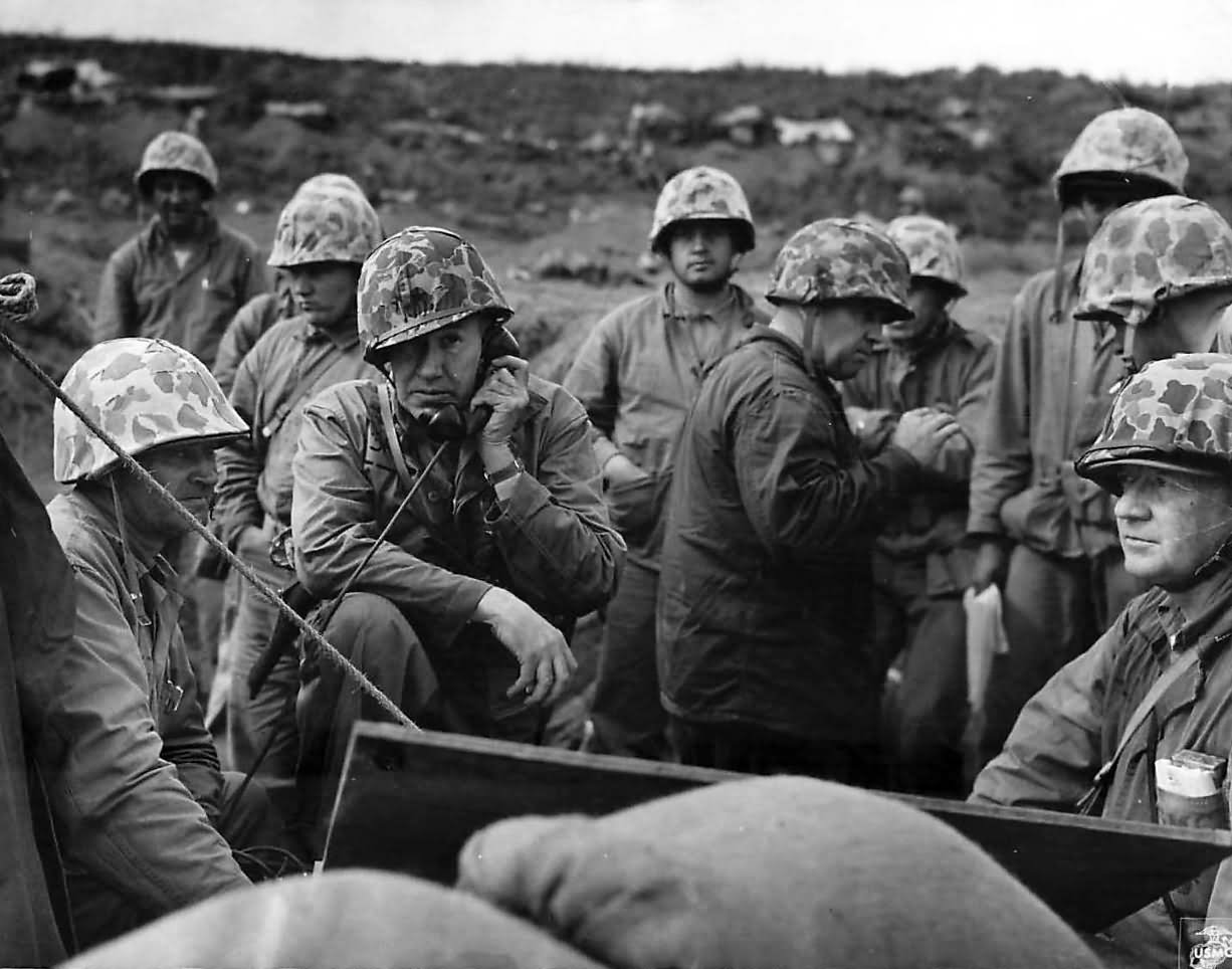 Officers of the 5th Marine Div direct operations from a sandbagged position