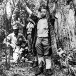 3 Japanese being captured during battle