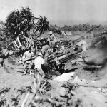 Howitzers in action Iwo Jima