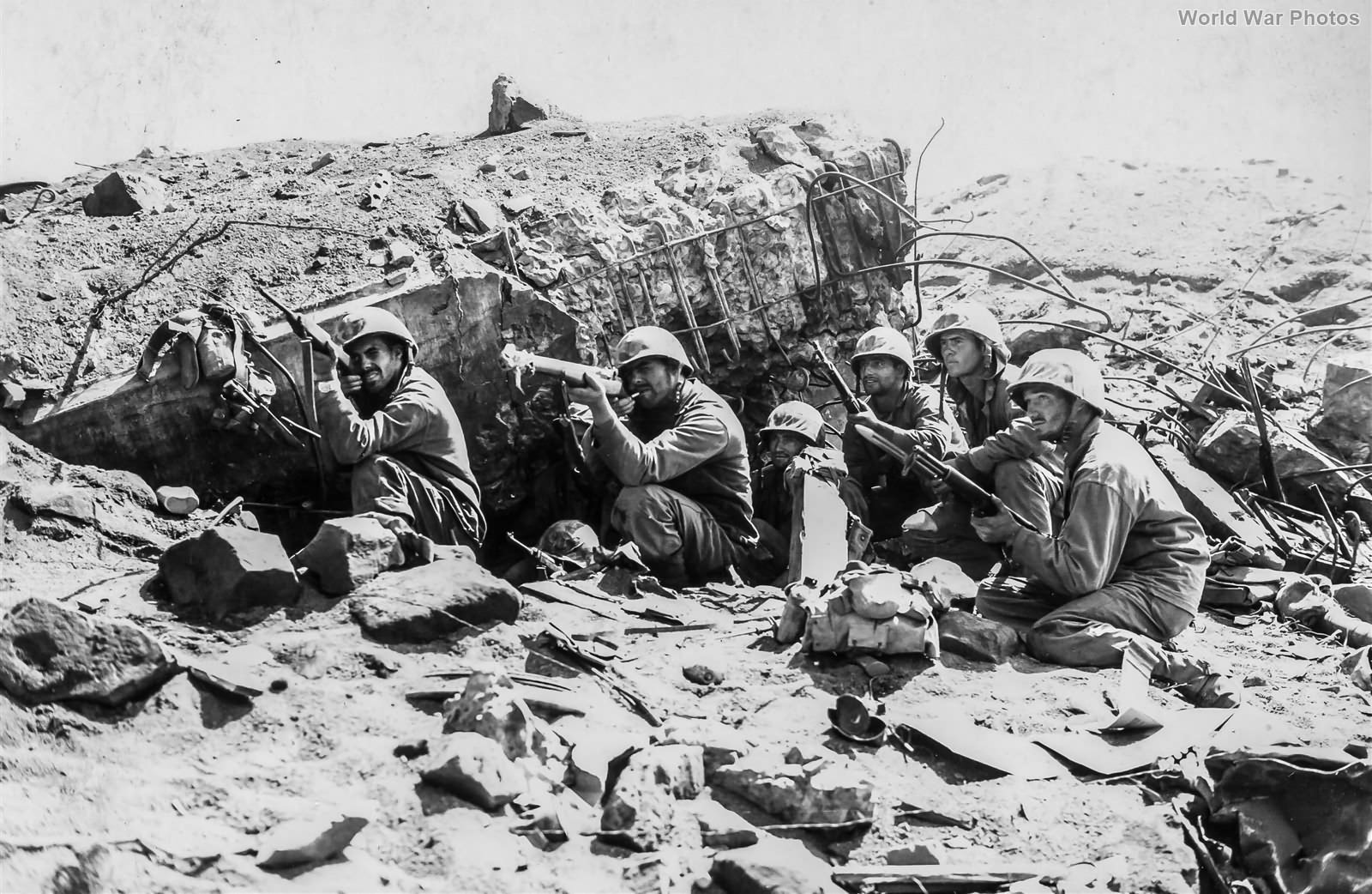 23rd Marines firing on Japanese holding the high ground on Iwo Jima
