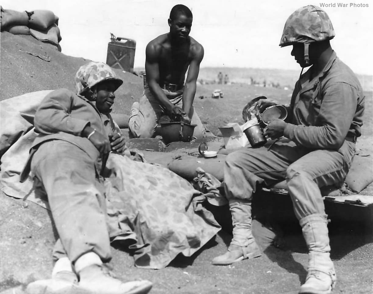 African-American Marines Rest on Beach of Iwo Jima
