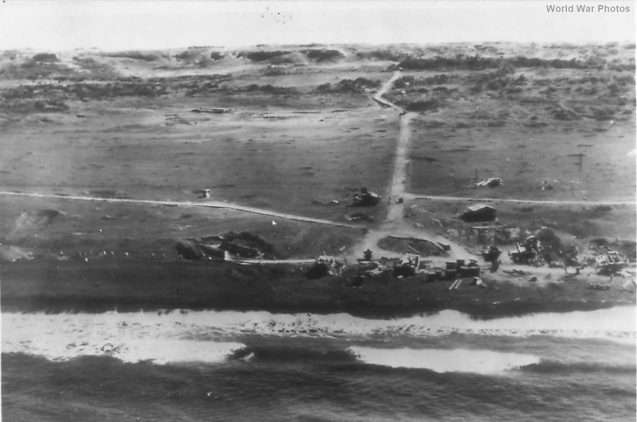 Japanese Soldiers Run for Cover as U.S. Plane Flies over Iwo Jima