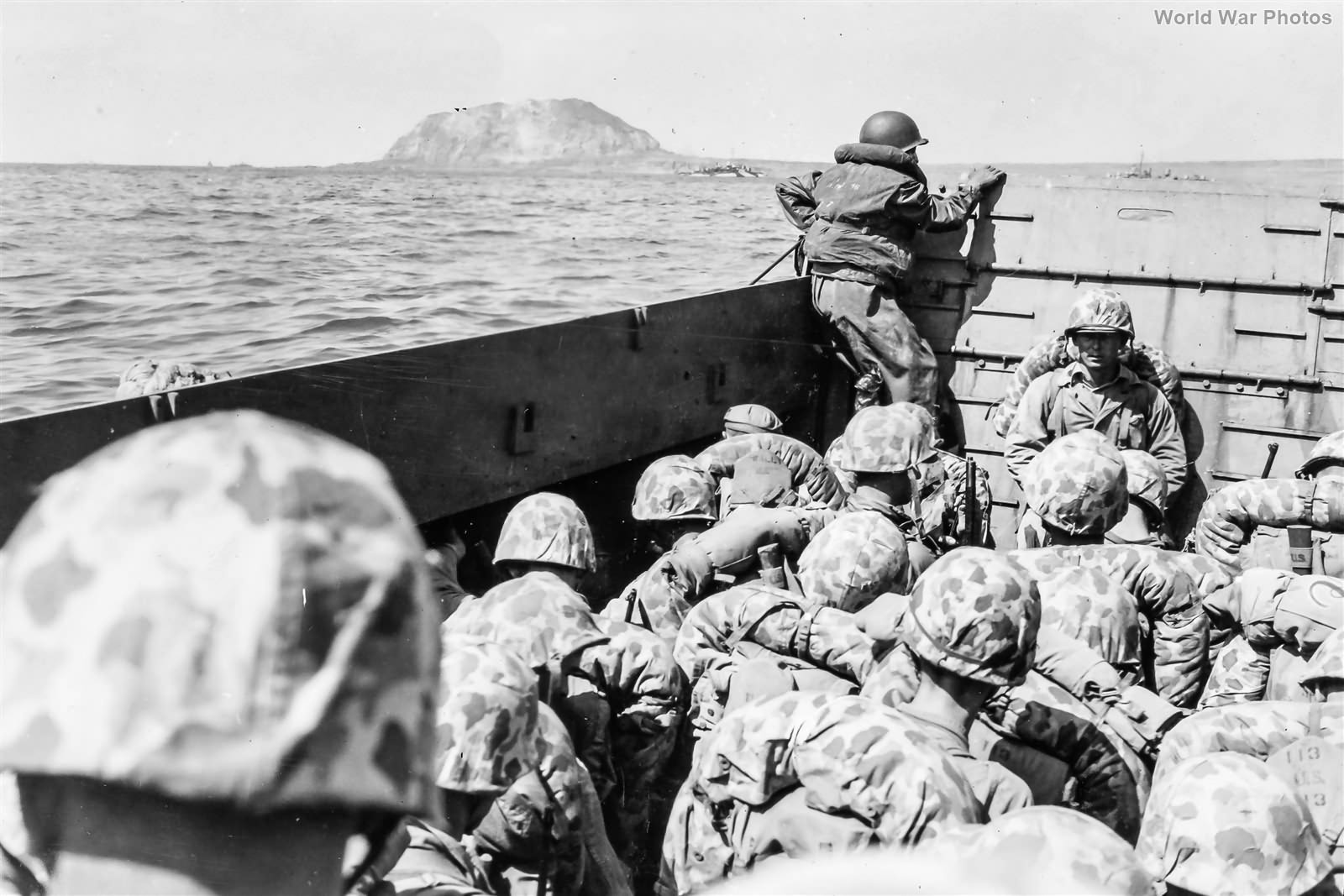 LCVP load of Marines off Iwo Jima on 1st Day of Invasion 19 February 1945