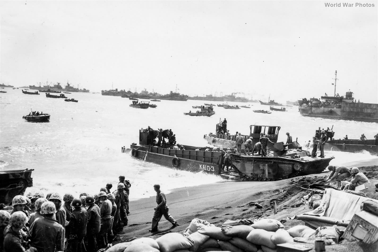 LVT, DUKWs and LCVPs at Iwo Jima Beach