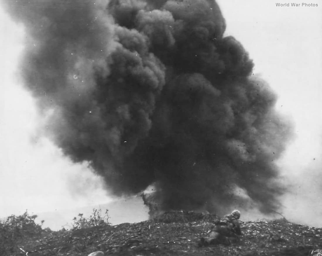 Marine demolition man blasts Japanese Pillbox on Iwo Jima