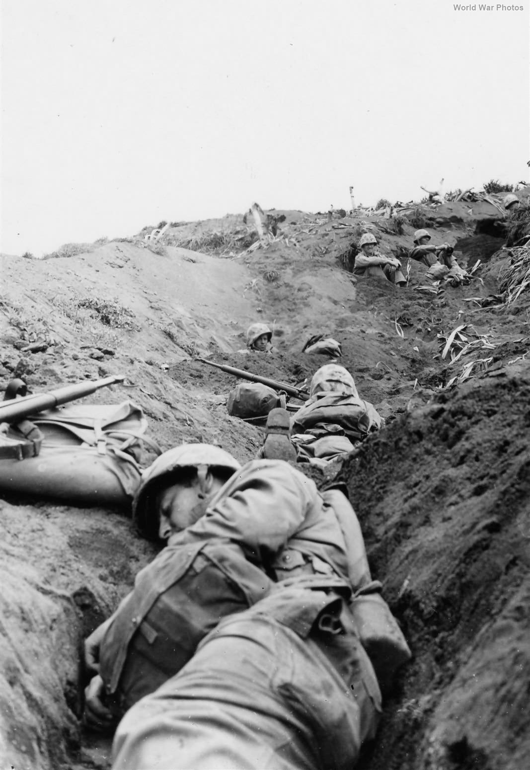 Marines dug In on Iwo Jima under mortar fire 22 February 1945