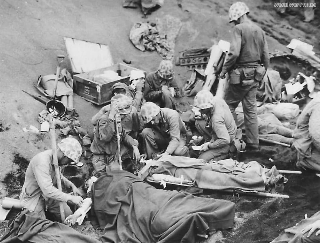 Wounded Marines being treated at Aid Station on Iwo Jima