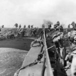 4th Marines pour ashore from LCVP at Iwo Jima