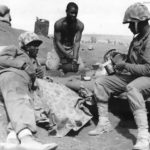 African-American Marines Rest on Beach of Iwo Jima