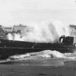 LCM PA-46 from USS Knot battered by surf on Beach of Iwo Jima