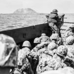 LCVP load of Marines off Iwo Jima on 1st Day of Invasion 19 February 1945