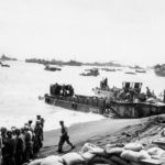 LVT, DUKWs and LCVPs at Iwo Jima Beach