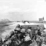 LVTs jam-packed with 4th Marine Division troops