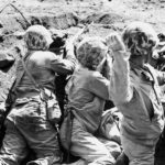Marine Throws Grenade on Iwo Jima February 1945