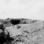 Marine Tommy Gunner covers Japanese Pillbox 1st Day on Iwo Jima 19 February 1945
