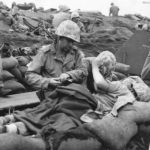 Wounded Marines being treated at Aid Station on Iwo Jima 2