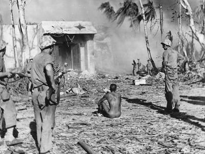 4th Division Marines guard Japanese soldier on Roi Namur