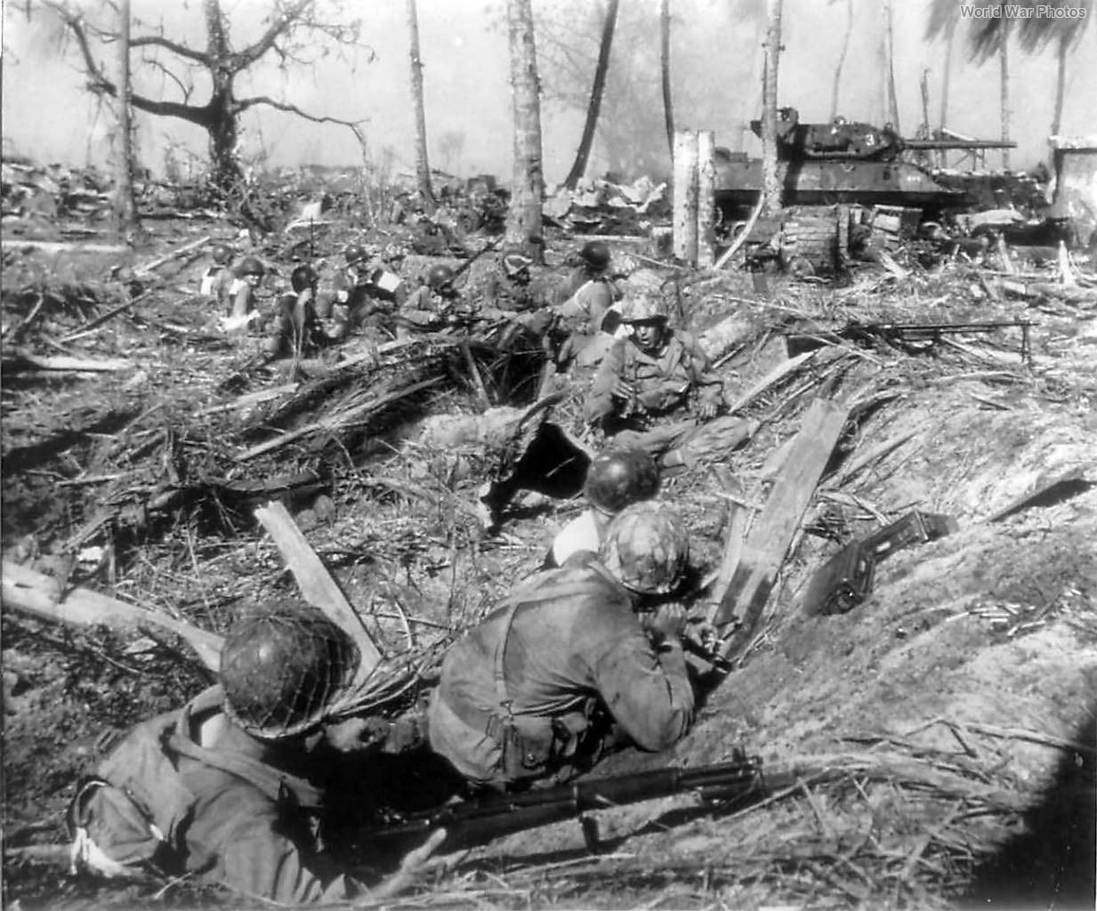 7th Infantry Division soldiers and 767th Tank Battalion M10 advance on  Kwajalein | World War Photos