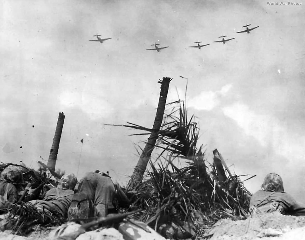 Avengers flying over Marines advancing to the north end of Namur