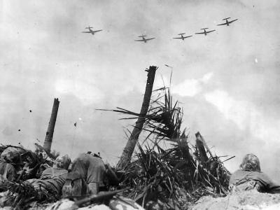 Avengers flying over Marines advancing to the north end of Namur