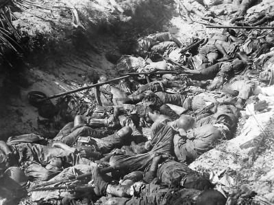 Bodies of fallen Japanese soldiers in trench on Namur Island