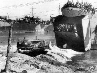 Bulldozer aids LST Roi Island