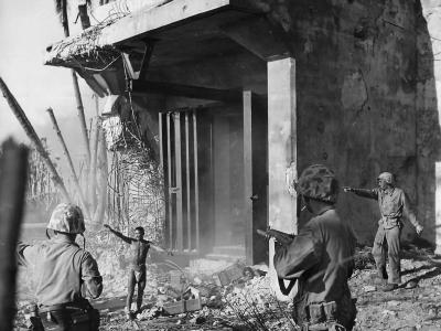 Japanese soldier surrendering to troops of the 4th Marine