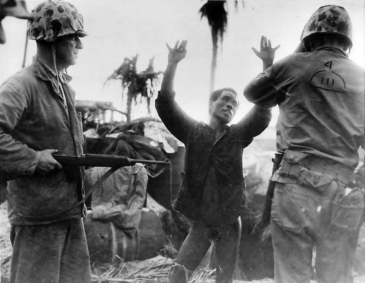 Japanese soldier surrenders to Marines on Namur
