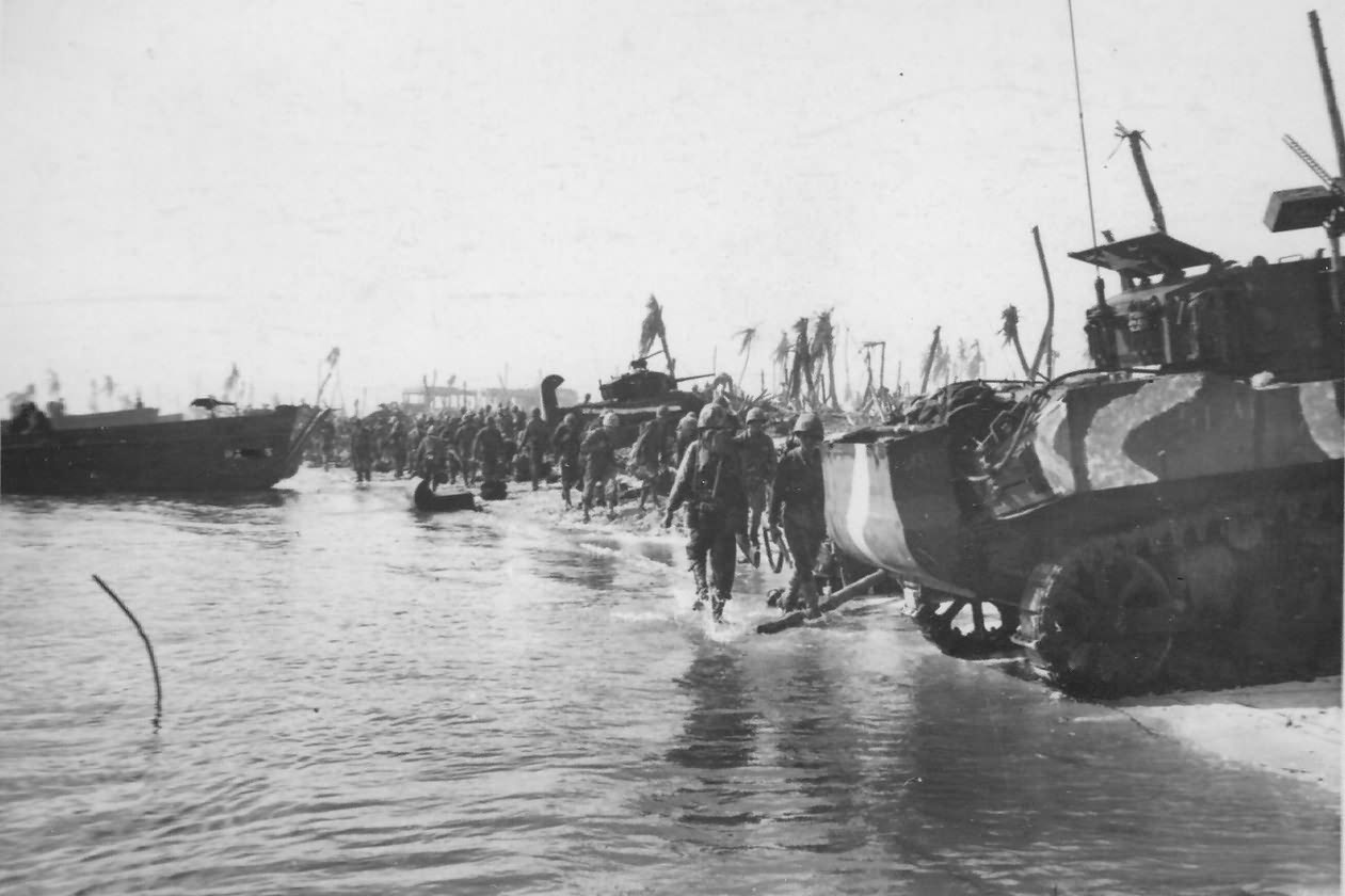 M5A1 of Co B, 4th Tank Battalion, roll ashore at 13.00 on Green 2 Namur Island