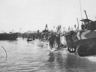 M5A1 of Co B, 4th Tank Battalion, roll ashore at 13.00 on Green 2 Namur Island