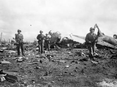 Marine patrol and Japanese aircraft wrecks at Roi Airfield Kwajalein