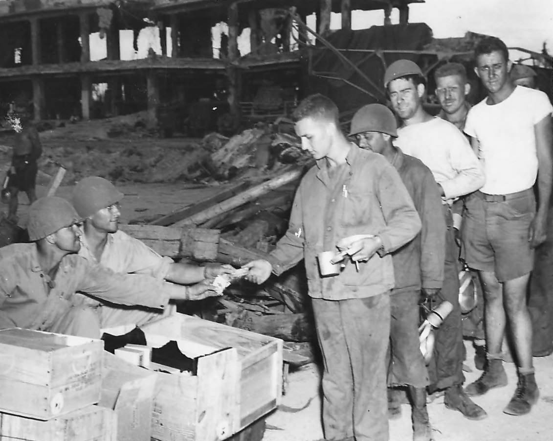 Red Cross gives cigarettes to 4th Division Marines on Kwajalein