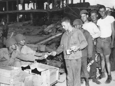 Red Cross gives cigarettes to 4th Division Marines on Kwajalein
