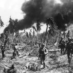7th Infantry Division soldiers advance on Kwajalein
