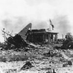 American flag over ruins of Japanese Headquarters on Namur