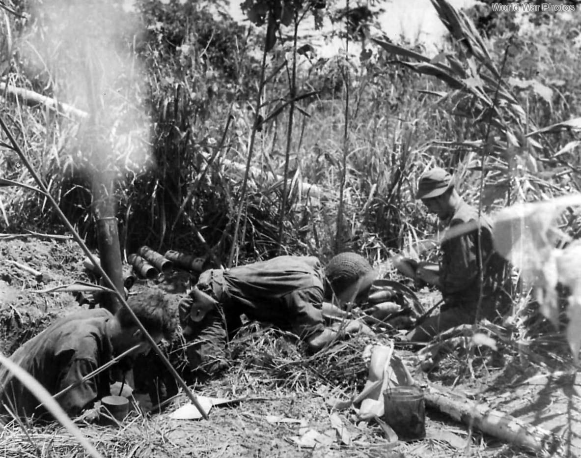 32nd Division mortar crew in action during Battle for Buna 1942